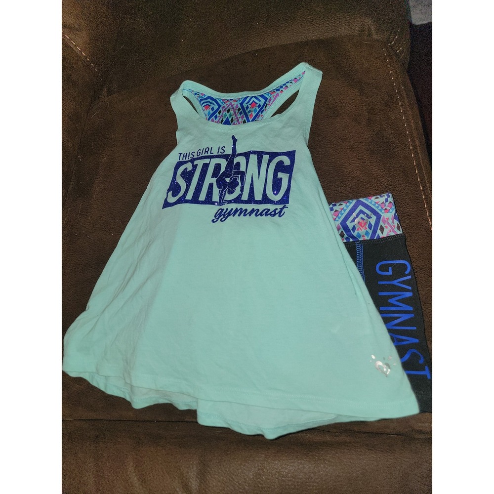 Justice gymnast this girl is strong top size 6 active shorts size 7